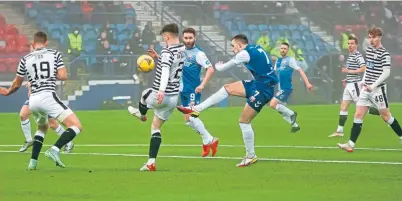  ?? ?? Montrose scorer Graeme Webster fires in a shot on the Queen’s Park goal