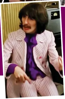  ??  ?? While my tailor gently weeps: George cuts a dash in a striped pink suit and purple shirt