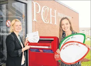  ?? SUBMITTED PHOTO/BEVAN WOODACRE ?? Sandra Zarvie, left, and Lisa Schurman-Smith, of the PCH Foundation staff get prepared for Lights for Life. Packages like the ones Zarvie is holding are in mailboxes now. Gifts can also be made online at pchcare.com or in the PCH Foundation office in...