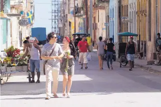  ??  ?? Giacomo Gianniotti as Kris and Ana Golja as Mina in “The Cuban.”