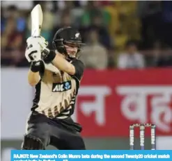  ??  ?? RAJKOT: New Zealand’s Colin Munro bats during the second Twenty20 cricket match against India in Rajkot. — AP