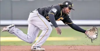  ?? Matt Freed/Post-Gazette ?? Gift Ngoepe hit .429 through 20 games this spring with the Pirates.