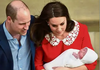  ??  ?? Hush, little baby! Prince William and Catherine, The Duchess of Cambridge, leaving the Lindo Wing at St Mary’s Hospital with their newborn son in London. — Reuters