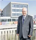  ??  ?? Stockton University president Harvey Kesselman shows off the school’s new beachfront campus.