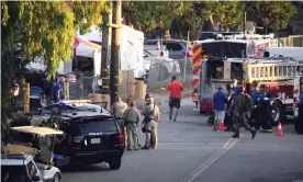  ?? Photograph: Neal Waters/Zuma Wire/Rex/Shuttersto­ck ?? The scene in Gilroy. The gunman was killed by officers who rushed him within a minute of bullets being heard.