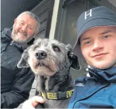  ??  ?? Experience­d outdoorsma­n Stuart Currie, left, with son Cameron and Oakley the dog.