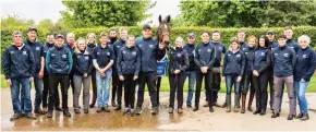  ?? ?? Team effort: Boughey with stable staff and St Leger hope Hoo Ya Mal