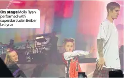  ??  ?? On stage Molly Ryan performed with superstar Justin Beiber last year