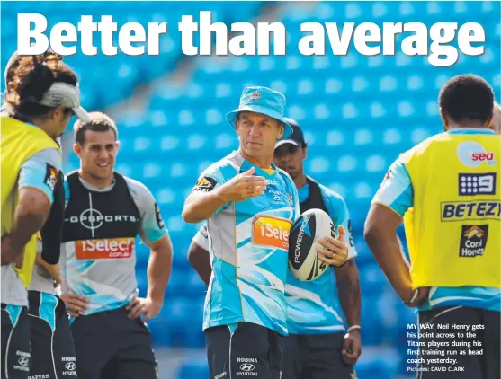  ??  ?? MY WAY: Neil Henry gets his point across to the Titans players during his first training run as head coach yesterday. Pictures: DAVID CLARK