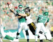  ?? MICHAEL Bell/regina Leader-post ?? Saskatchew­an Roughrider­s quarterbac­k Darian Durant has
been the target of linemen and fans of the CFL team.