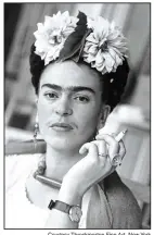  ?? Courtesy Throckmort­on Fine Art, New York ?? Frida Kahlo poses for Nickolas Muray in 1941. The photo is titled Frida with Cigarette.