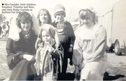  ??  ?? Mrs Caslake, with children Rosalind, Timothy and Sara, and little Philip Caslake at Rufford Old Hall