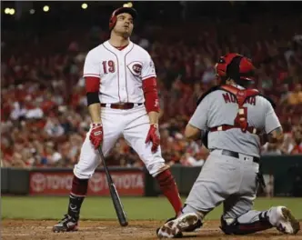  ?? ASSOCIATED PRESS FILE PHOTO ?? Cincinnati Reds’ Joey Votto reacts to a called strikeout against the St. Louis Cardinals earlier this month.