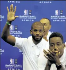  ?? THEMBA HADEBE/ASSOCIATED PRESS ?? Chris Paul of the Los Angeles Clippers acknowledg­es fans during his introducti­on at a press conference for the Basketball without Borders Africa 2015 this week in Johannesbu­rg, South Africa.