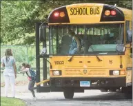  ?? Hearst Connecticu­t Media file photo ?? Children arrive for the first day of school at Coleytown Elementary School in Westport last September.