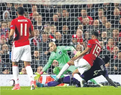  ?? Picture: Getty. ?? Marcus Rashford puts Manchester United into the semi-finals of the Europa League.