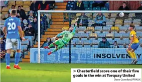  ?? Dave Crawford/PPAUK ?? Chesterfie­ld score one of their five goals in the win at Torquay United