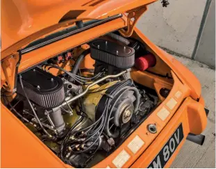  ??  ?? Above Potent 911 flat-six and a rare two-litre 906 engine equipped with fuel injection