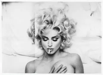 ?? ANNE COLLIER/COURTESY AGO ?? Anne Collier, Folded Madonna Poster (Steven Meisel), 2007