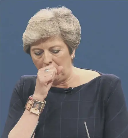  ?? PICTURE: PA ?? Splutterin­g Theresa May gained some sympathy after her conference speech disaster