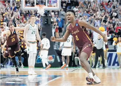  ?? TONY GUTIERREZ/AP ?? Loyola-Chicago guard Donte Ingram (0) celebrates sinking a three-point basket with .03 seconds left to beat Miami on Thursday.