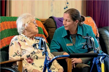  ?? ANDY JACKSON / FAIRFAX NZ ?? Rebecca Monti, caregiver at Opunake Cottage Rest Home, is worried for the residents she calls family, such as Esther McCall.