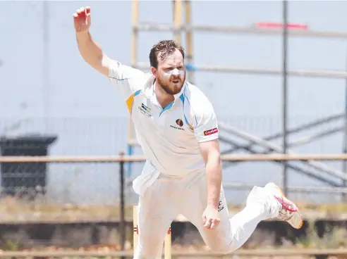  ?? Picture: BRENDAN RADKE ?? RACE ON: Spin bowler Chris Stanger on the attack in the Open Mens' representa­tive cricket match between Cricket Far North and North Queensland Cricket, held at Griffiths Park, Manunda.