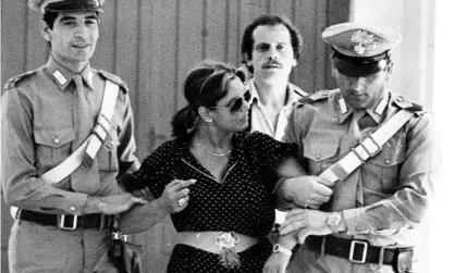  ?? ?? The arrest of Puppeta Maresca, a boss of Camorra in Naples on 31 January 1993. Photograph: Napoli/Giacomino/Zuma Press/eyevine