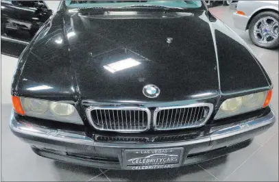  ?? Madelyn Reese ?? Tupac Shakur was fatally wounded in 1996 in the BMW above, seen Thursday at Celebrity Cars Las Vegas. Las Vegas Review-journal