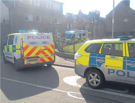  ??  ?? Emergency services outside the property in Lower Hall Street.