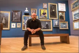  ?? NWA Democrat-Gazette/SPENCER TIREY ?? Shane Richey, creative director of experiment­ation and developmen­t at Crystal Bridges Museum of American Art, sits Friday in one of the main galleries at the Bentonvill­e museum. Richey is developing ideas on augmented reality audio programs for the museum.