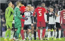  ?? Picture: REUTERS ?? Fulham’s Harrison Reed and Harry Wilson look dejected after their Carabao Cup semi-final second leg match against Liverpool at Craven Cottage in London, Britain.