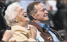  ?? DAVID J. PHILLIP/AP 2009 ?? Barbara Bush and former President George H.W. Bush