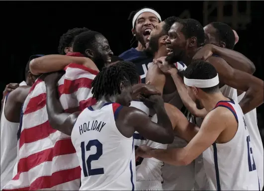  ?? File photo ?? In a bid to retain their Olympic title, the United States is relying on talented defensive players like Boston’s Jrue Holiday along with Anthony Davis, Joe Embiid and Kawhi Leonard in Paris.