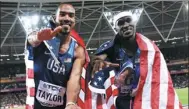  ?? DYLAN MARTINEZ / REUTERS ?? Christian Taylor and Will Claye celebrate their American one-two at the world championsh­ips.