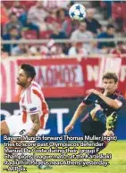  ??  ?? Bayern Munich forward Thomas Muller (right) tries to score past Olympiacos defender Manuel Da Costa during their group F Champions League match at the Karaiskaki stadium in Piraeus near Athens yesterday. – AFPpix