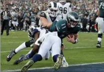  ?? MARK J. TERRILL, THE ASSOCIATED PRESS FILE PHOTO ?? Philadelph­ia Eagles quarterbac­k Carson Wentz, one of the top young quarterbac­ks, suffered a season-ending knee injury when he was tackled in a game against Los Angeles Rams on Dec. 10.