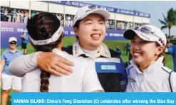  ??  ?? HAINAN ISLAND: China’s Feng Shanshan (C) celebrates after winning the Blue Bay LPGA golf tournament at Jian Lake Blue Bay Golf Course. — AFP