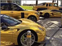  ??  ?? Golden fleet: The supercars he takes on holiday