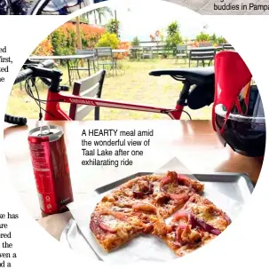  ??  ?? A HEARTY meal amid the wonderful view of Taal Lake after one exhilarati­ng ride