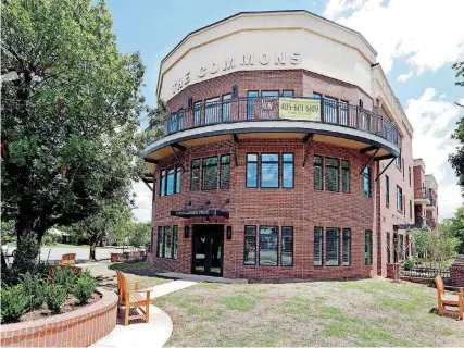  ??  ?? Classen Commons, the first new affordable housing built downtown in decades, officially opened Tuesday at 1320 Classen Drive.
[PHOTOS BY STEVE SISNEY, THE OKLAHOMAN.]