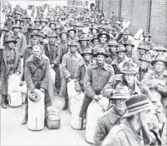  ?? COPIES OF PICTURE AVAILABLE FROM ODT FRONT OFFICE, LOWER STUART ST, OR WWW.OTAGOIMAGE­S.CO.NZ ?? Men of the 24th Reinforcem­ents, with their kitbags. — Otago Witness, 25.4.1917.