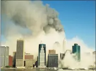  ?? Kathy Willens / AP ?? A view of the Manhattan skyline from Brooklyn, Tuesday, Sept. 11, 2001, after the World Trade Center towers collapsed.