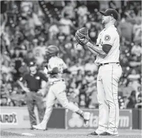  ?? Mark Mulligan / Staff photograph­er ?? Usually reliable closer Ryan Pressly served up a game-tying three-run homer to the Padres’ Fernando Tatis Jr. with two outs in the ninth, part of the latest implosion by a bullpen that continues to bedevil the Astros.