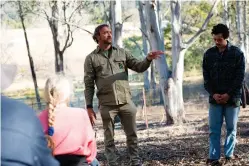  ??  ?? Through mentoring and leadership, Victor Steffensen (at left), a Tagalaka man, works to revive traditiona­l knowledge and values passed to him by elders Dr Tommy George and Dr George Musgrave.