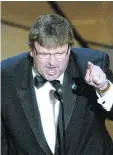  ??  ?? Michael Moore’s speech — criticizin­g then-president George W. Bush — polarized the crowd at the 2003 Academy Awards.