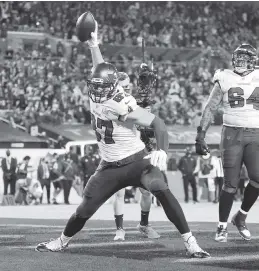  ?? BEN LIEBENBERG AP ?? Buccaneers tight end Rob Gronkowski celebrates after a touchdown against the Chiefs. Gronkowski and QB Tom Brady hooked up for two touchdown passes in the first half.