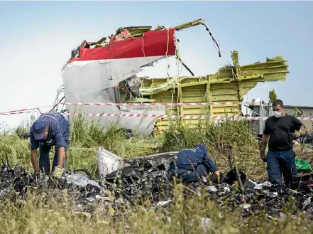  ??  ?? The missile that downed Malaysia Airlines Flight MH17 was fired from a launcher transporte­d from Russia to rebel positions in Ukraine and taken back across the border soon afterwards.