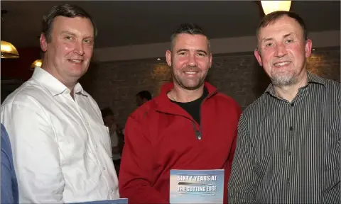  ??  ?? Iain Wickham, Trevor Moulton and Jim McGovern at the launch of Joe Casey’s book ‘Sixty Years at the Cutting Edge’ in Mernagh’s of Oylegate.