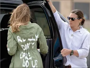  ?? AP PHOTO/ ANDREW HARNIK ?? First lady Melania Trump walks to her vehicle as she arrives at Andrews Air Force Base, Md., Thursday after visiting the Upbring New Hope Children Center run by the Lutheran Social Services of the South in McAllen, Texas.